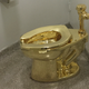 The 18-karat crapper in question. (Photo: WILLIAM EDWARDS/AFP/Getty Images)